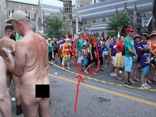 Two small children being exposed to the disordered sexuality on display at the shame parade.