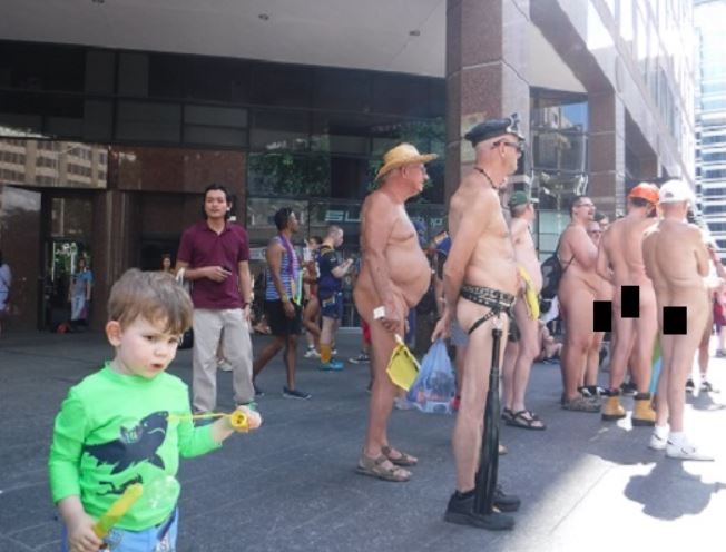 Another young child being exposed to the disordered sexuality on display at the 2016 Toronto Gay Pride parade.