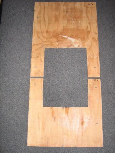 FRTW plywood window panel, split in half (8 eyelets for window hooks barely visible).