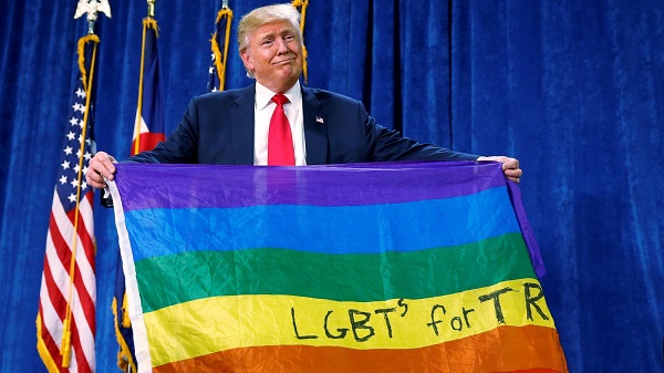 Donald Trump protecting his political career, by strutting around with the gay flag.
